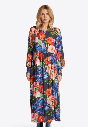 Blumenkleid mit kräftigen roten, rosa und blauen Blumen auf dunklem Hintergrund. Lange Ärmel mit gerafften Manschetten und fließender Silhouette.