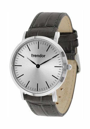 Round silver watch with black hour and minute hands, black leather strap, and "trendor" logo on the face showing 10:10.