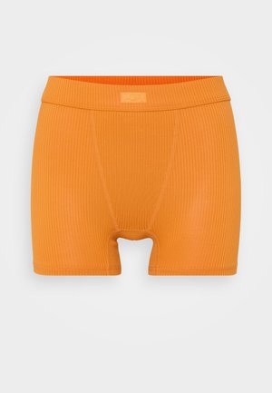 Orange ribbede boxershorts med en ensartet tekstur, udstyret med en bred taljeafsnit og en frontlomme. Ingen yderligere mønstre eller udsmykninger.