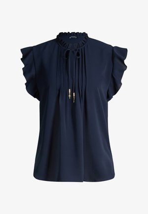 Granatowa bluzka z falbanianym kołnierzem, wiązaniem przy dekolcie z złotymi akcentami, pionowymi plisami na przodzie i krótkimi, zwiewnymi rękawami.