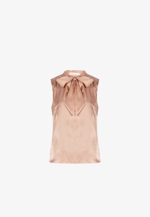 Blusa senza maniche in raso rosa cipria con un sottile motivo a puntini e un ampio fiocco annodato al collo.