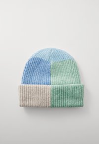 Knit beanie featuring a patchwork design in light blue, green, and beige. Textured ribbed pattern with a folded brim.