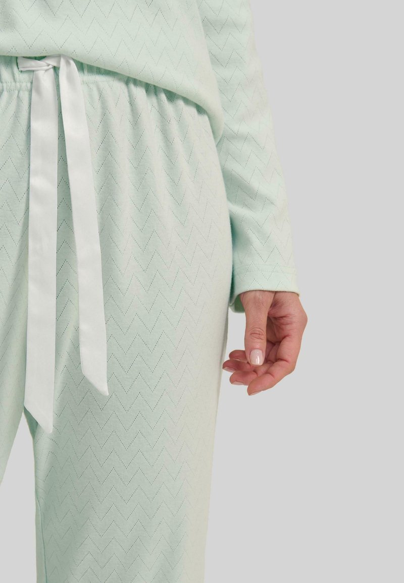 Pijama largo algodón hombre Beto Gris mezcliyado – Tramas Pijama largo algodón hombre Beto Gris mezcliyado – Tramas