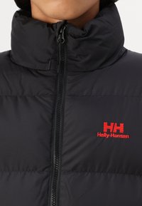 Helly Hansen YU MODULAR PUFFER JACKET UNISEX - Zimska jakna - black