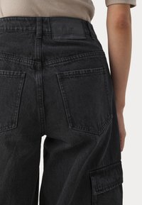 adidas Originals CAPRI - Džinsiniai šortai - black