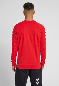 Hummel HMLGO  - Sudadera - true red