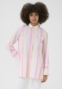 Long-sleeve button-up shirt featuring pink, yellow, and white vertical stripes. Collared design with a chest pocket and cuffed sleeves.
