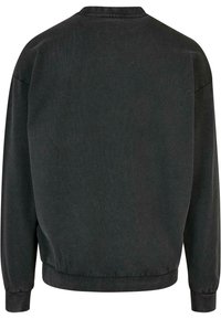 Sweat-shirt noir à manches longues avec col rond, poignets et ourlet élastiques, montré de dos avec un design uni et sobre.