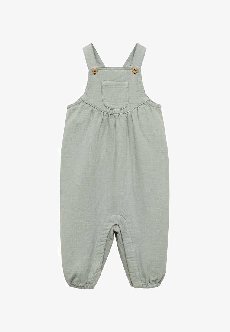 Ljusgrön bomullsoverall med justerbara spännen, framficka och två träknappar. Elastiska ärmslut vid ankeln. Enkel, avslappnad design.