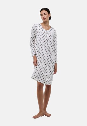 Chemise de nuit blanche avec un motif fleuri, manches longues, encolure ronde et détail froncé au niveau de la poitrine. Tissu doux avec une coupe décontractée.