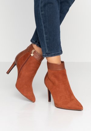 Tamaris Heart & Sole Bottines à talons hauts - cognac