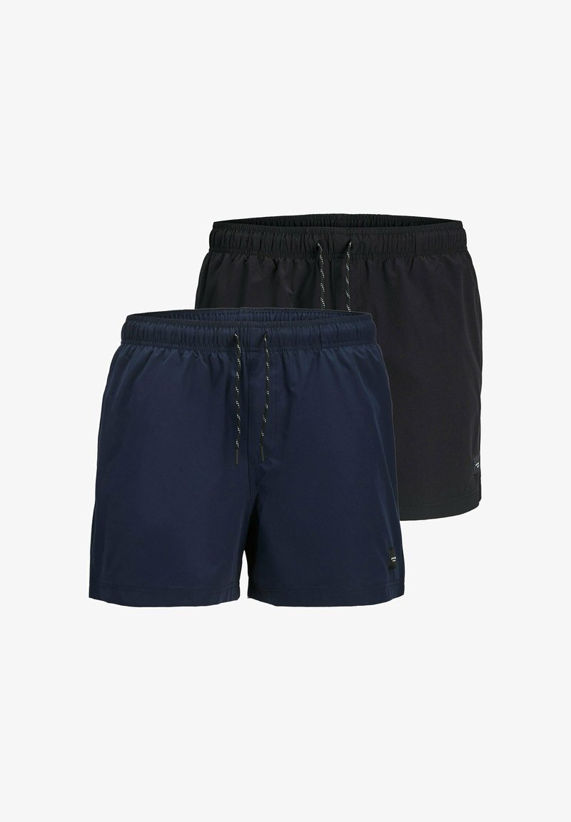 Deux paires de shorts de bain, l'une marine et l'autre noire, avec des ceintures élastiques dotées de cordons et un tissu lisse et léger.
