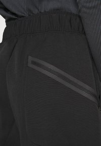 Nike Sportswear Tygbyxor - black