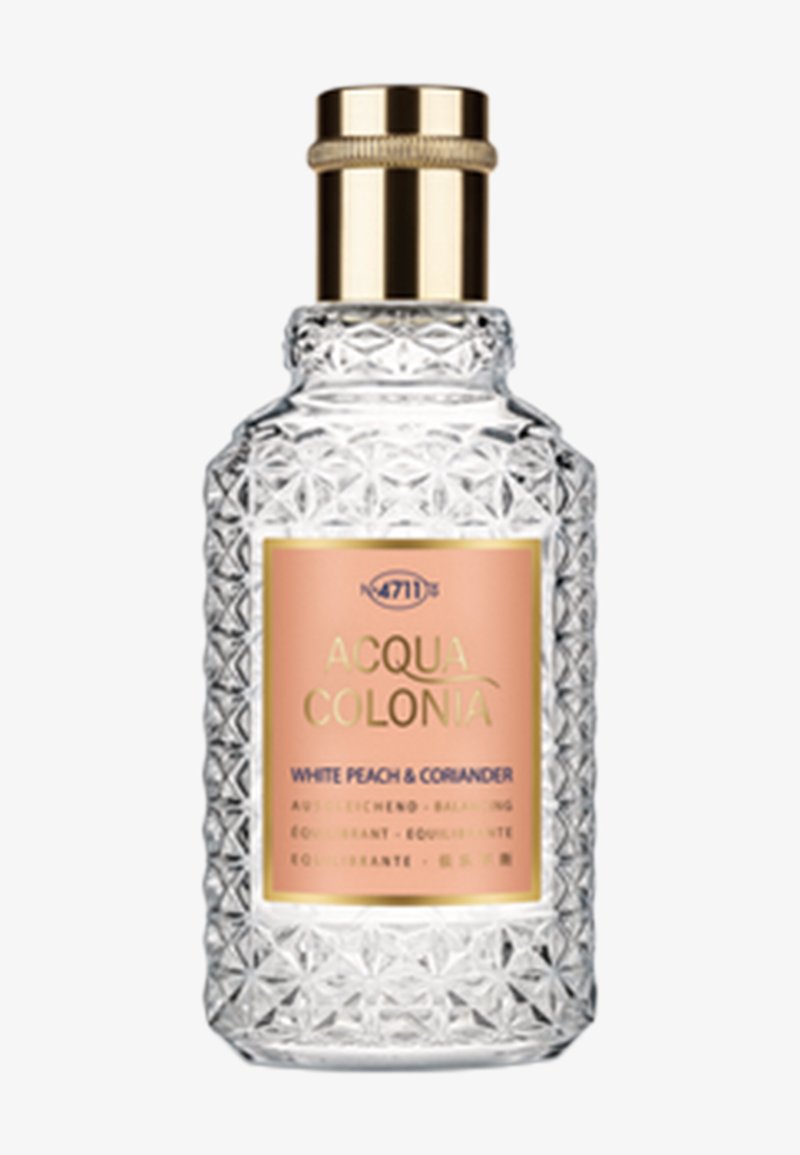 Klare, strukturiertes Glas-Parfümfläschchen mit goldenem Verschluss und pfirsichfarbenem Etikett mit der Aufschrift "Acqua Colonia White Peach & Coriander".