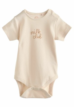 Kurzärmeliger, hellbeiger Overall aus weicher Baumwolle mit gesticktem "Milk Club"-Text in passendem Farbton und Druckknöpfen im Schritt.