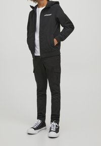 Jack & Jones Junior JJERUSH BLOCKING NOOS JNR - Allvädersjacka - black