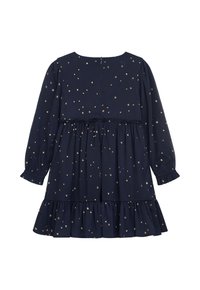 Marineblaues Kleid mit langen Ärmeln, gerafftem Taillenbereich und Rüschensaum, das goldene Sternstickereien enthält. Mit Knopfverschluss im Rücken.