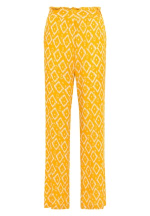 Žlté nohavice s diamantovým dizajnom v bielej farbe. Tkanina je ľahká, so voľným strihom a zhnutým pásom.