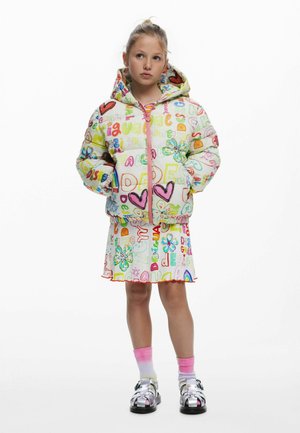 Puffy jacket with colorful printed patterns, pink zipper, and hood. Paired with a matching skirt featuring decorative trim and playful designs.