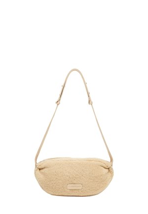 Beige faux fur shoulder bag with smooth leather strap and a subtle logo patch. Curved shape with soft texture, ideal for casual use.
