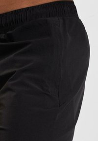DEF SHOP X EUROPEAN LEAGUE OF FOOTBALL MUNICH RAVENS - Joggebukse - black
