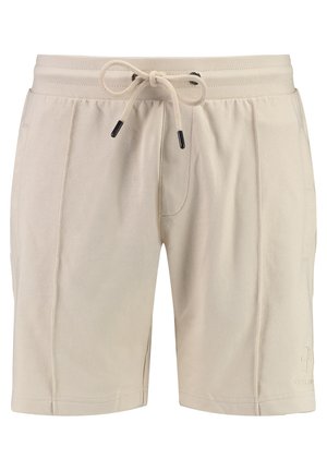 Bermudas deportivas beige fabricadas con un tejido texturizado, con una cinturilla elástica y cordón de ajuste, además de bolsillos laterales.