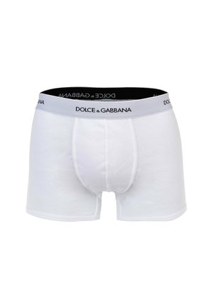 Calzoncillos bóxer de algodón acanalado blancos con cintura elástica negra con el logo de Dolce & Gabbana en fuente negra en el centro delantero.