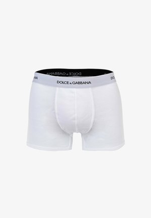 Weiße gerippte Baumwoll-Boxershorts mit schwarzem elastischem Bund, vorne mittig mit Dolce & Gabbana-Logo in schwarzer Schrift.