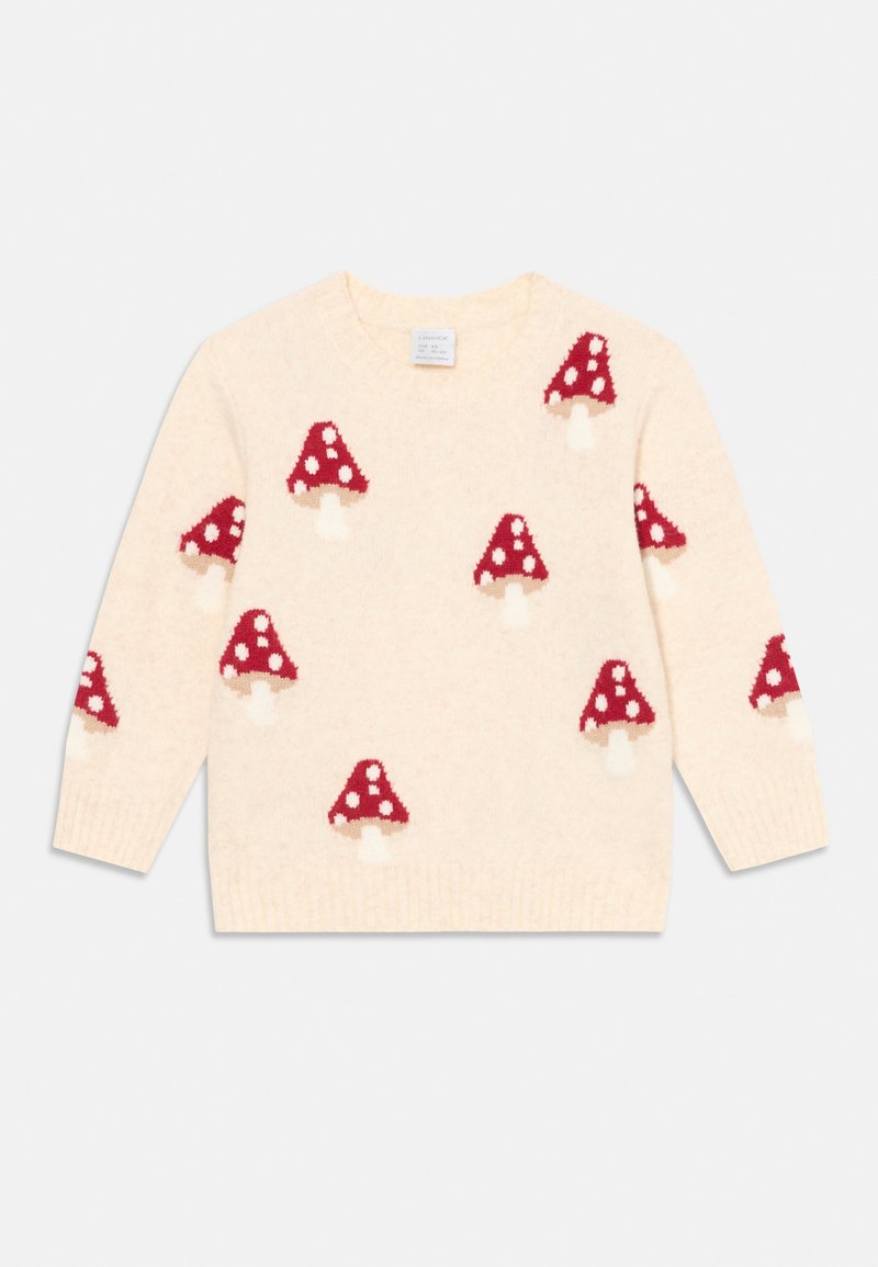 Maglione color crema con motivi di funghi a pallini rossi e bianchi sparsi sul davanti e sulle maniche.