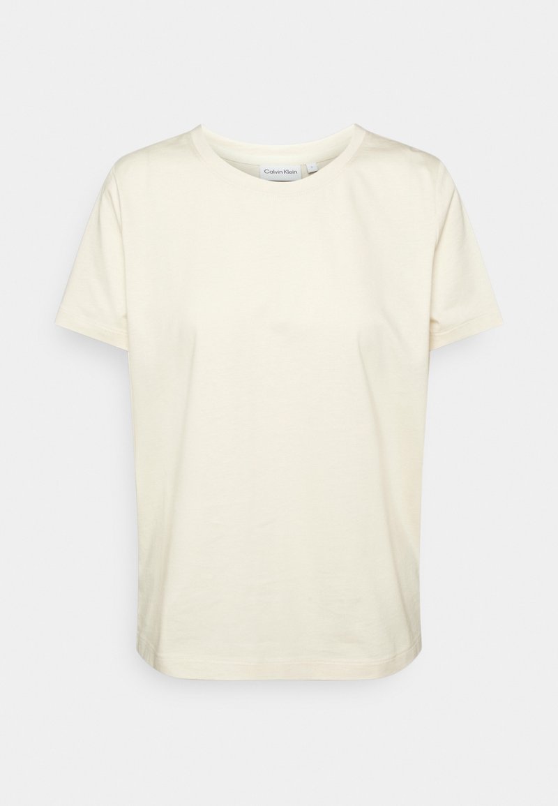 T-shirt en coton ivoire uni à manches courtes et col rond, avec étiquette Calvin Klein à l'intérieur du col.