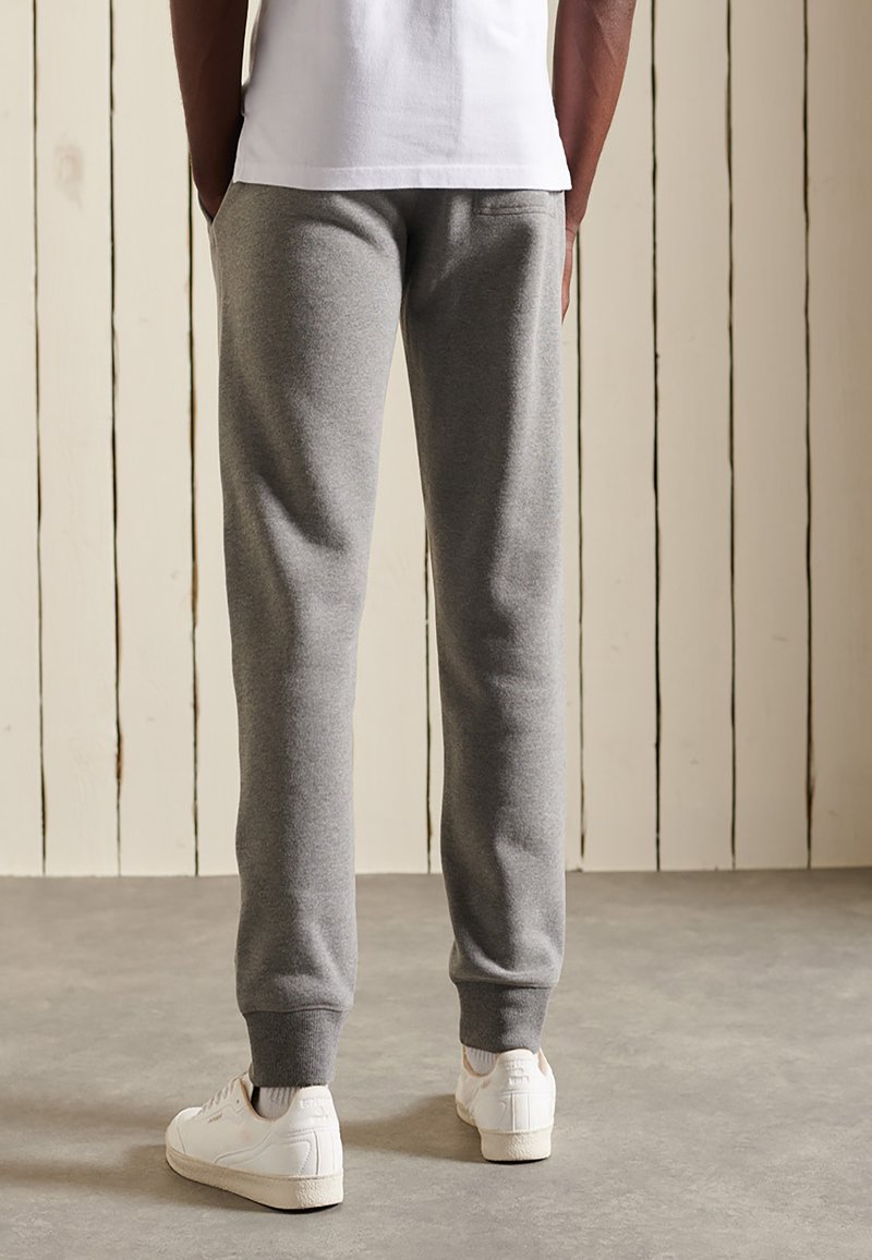 Herren Trainingsanzüge | Superdry Jogginghose dark marl/dunkelgrau - HF95925 Herren Trainingsanzüge | Superdry Jogginghose dark marl/dunkelgrau - HF95925