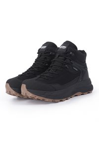 Black hiking boots with a textured upper, secure lacing system, and a rugged brown rubber outsole. Suitable for outdoor activities.