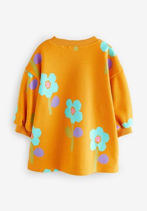 Orangene Sweatshirt mit großen pastellfarbenen Blumen in Blau, Pink und Grün. Mit herunterhängenden Schultern und einem gerippten Kragen sowie einer weichen Textur.