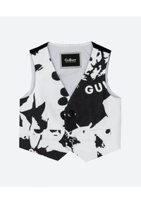 Svartvit mönstrad väst med två framfickor, knappslutning och en etikett på insidan. Tillverkad av texturerat tyg med olika former.