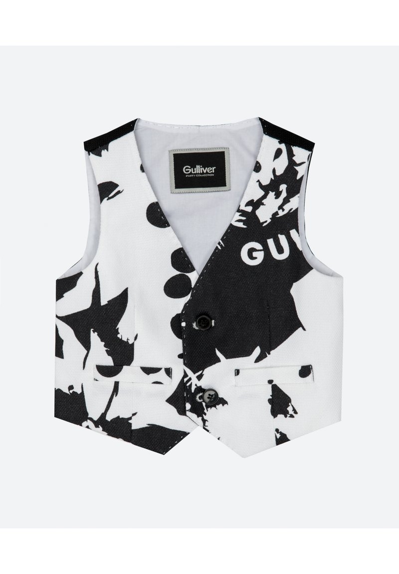 Svartvit mönstrad väst med två framfickor, knappslutning och en etikett på insidan. Tillverkad av texturerat tyg med olika former.