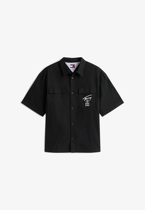 Must lühikeste varrukatega nööbitav särk kahe rinnataskuga, paremal taskul valge "Tommy" logo ja krae sees väike lipumärgistus.