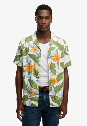 Short-sleeve button-up shirt featuring a white base, vibrant tropical floral print in orange and green, and a relaxed fit design.
