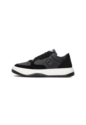 Black sneaker featuring a mix of smooth leather and suede, white rubber sole, textured side panel, and circular accent detail.