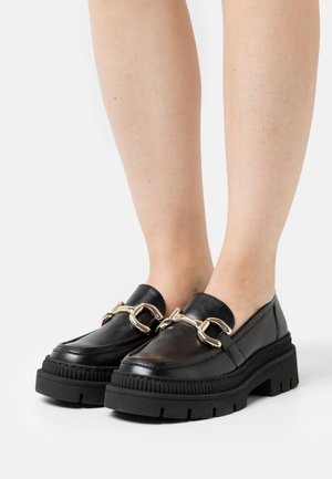 Marco Tozzi BY GUIDO MARIA KRETSCHMER - Slipper - black/gold