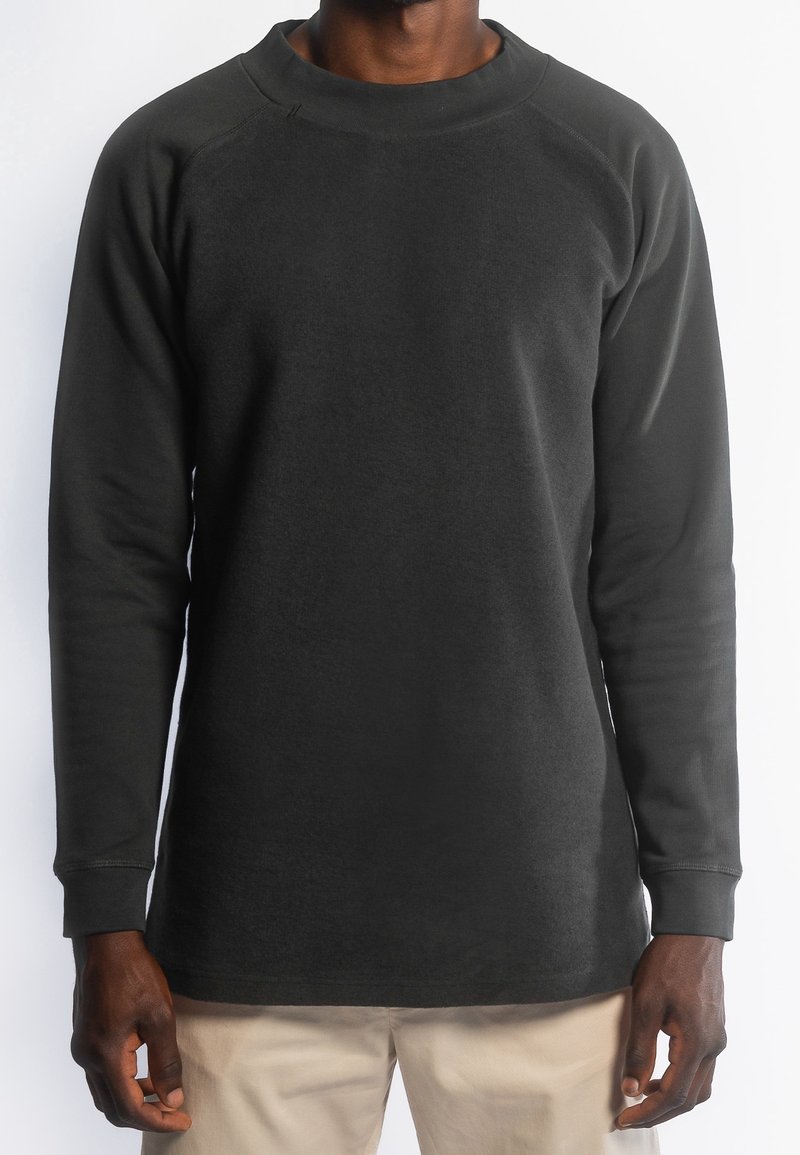 Zwarte sweatshirt met lange mouwen, gemaakt van een zachte katoenmengsel, met een ronde hals en geribbelde manchetten, in een relaxte pasvorm.