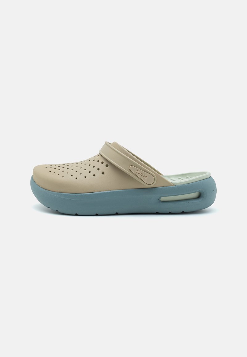 Tan lightweight clogs with ventilation holes, a blue rubber sole, and an adjustable back strap, featuring a logo on the side.