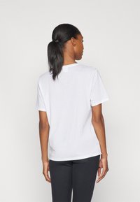 Peak Performance EXPLORE GRAPHIC TEE - T-Shirt print - white