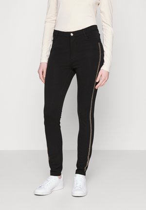 Spodnie materiałowe