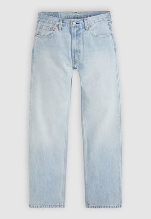 Šviesiai mėlyni džinsai iš džinso audinio su laisvu siluetu, penkios kišenės, užsegami sagomis, su subtiliomis oranžinėmis siūlėmis.