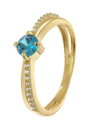 Goldring mit einem großen runden Türkisstein, akzentuiert mit kleineren klaren Steinen entlang einer Seite des Bandes.