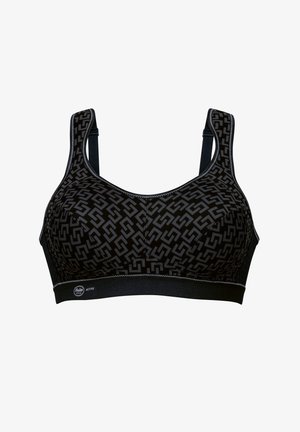 Zwarte sportbeha met geometrisch patroon, voorzien van verstelbare banden, een brede elastische band en contrasterende stikseldetails.