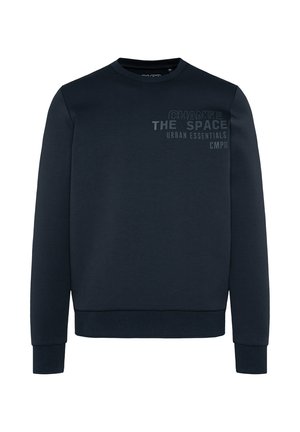 Marineblaue Sweatshirt aus weichem Stoff, mit Rundhalsausschnitt und gerippten Bündchen. Mit dem aufgedruckten Text "CHANGE THE SPACE URBAN ESSENTIALS".