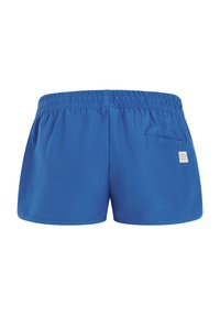 Bañador azul con cintura elástica y un pequeño bolsillo trasero con una etiqueta blanca en el lado derecho.