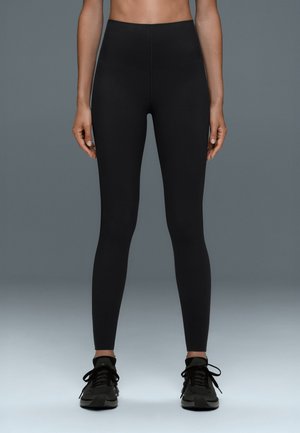 OYSHO, EXTRA COMPRESSIVE CORE CONTROL ANKLE LENGTH - Leggings - black