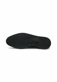 Sole of a black dress shoe with textured front, smooth middle section embossed with "BOSS," and rubber heel plate.